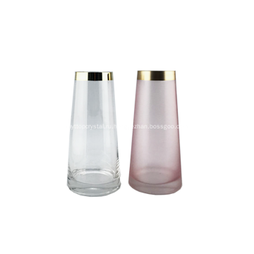 Прозрачная и розовая стеклянная ваза с золотой оправой